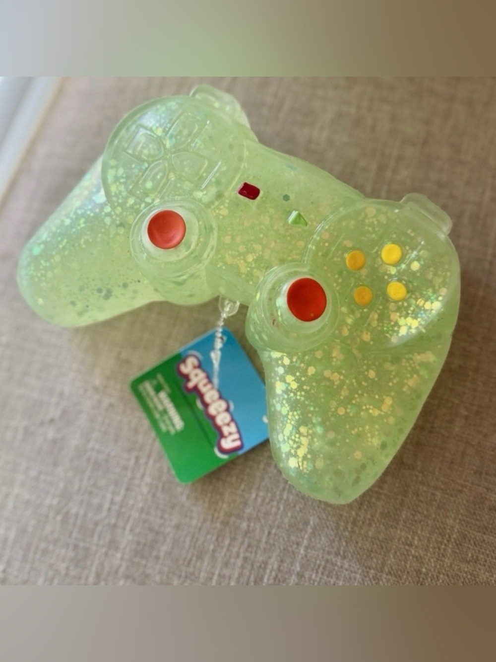 NWT Squeeezy Glitter Game Controller Squishy - Green